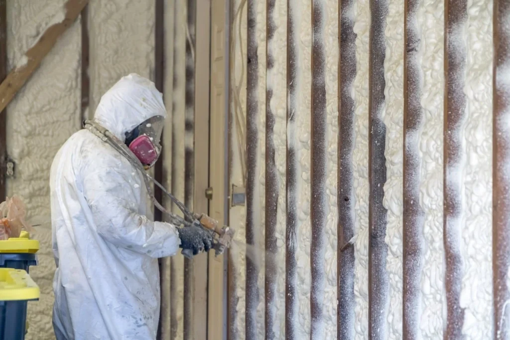 Spray foam insulation applied inside a new construction home in Long Island